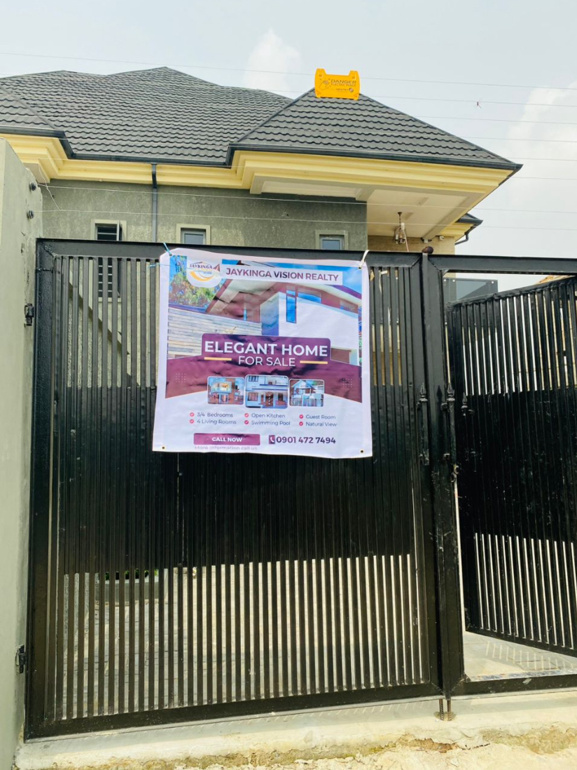 Jaykinga Vision Realty signage on an elegant home for sale in Lagos